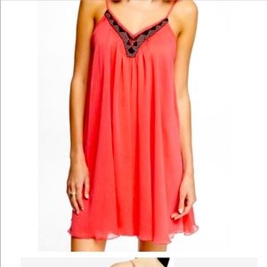 Bright coral express flowy dress.